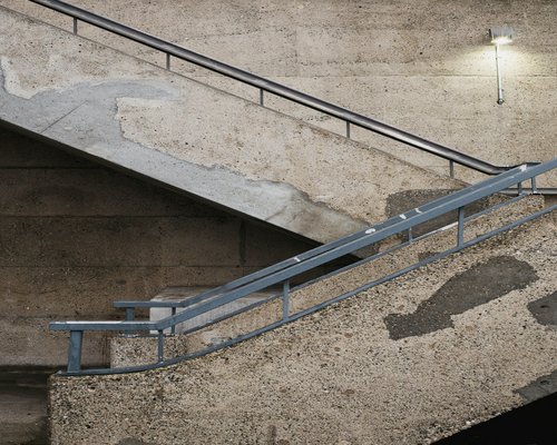 close up of feet on stair steps symbolizing taking progress towards a healthy lifestyle